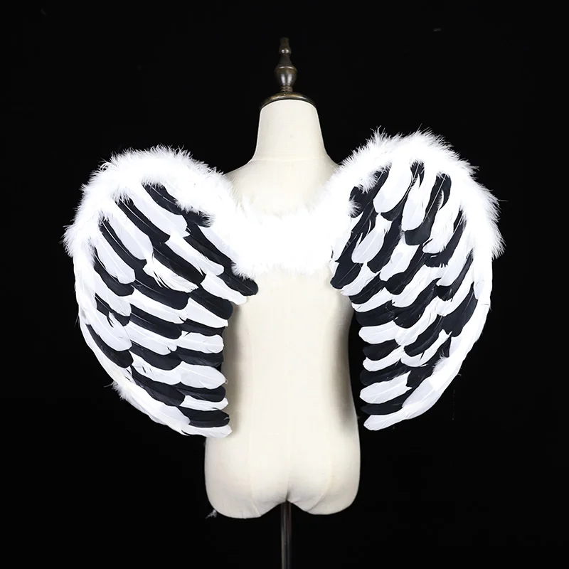 

Love models black and white mixed color feather wings toy angel photo photo photography performance catwalk props