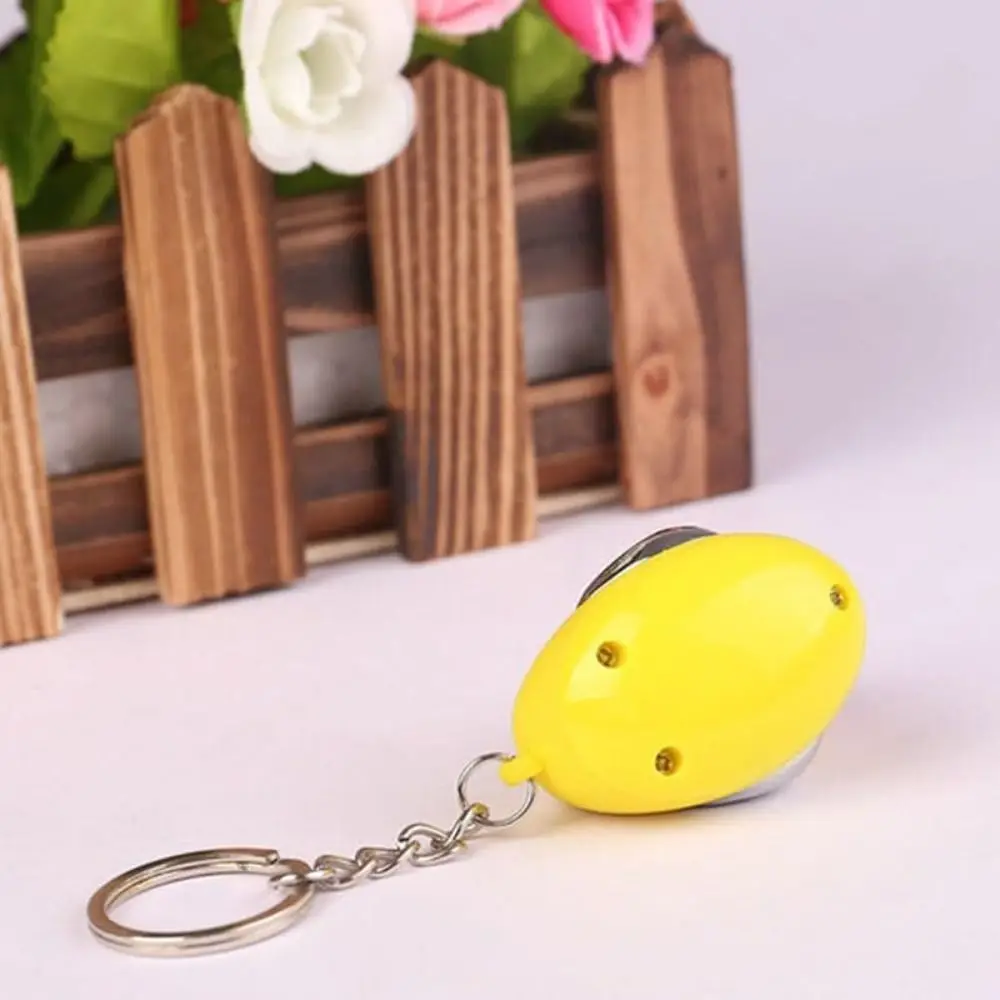 

Funny Electric Shocking Duck Keychain Cartoon With LED light Little Yellow Duck Keychain Portable Prank Toy for Car Keys