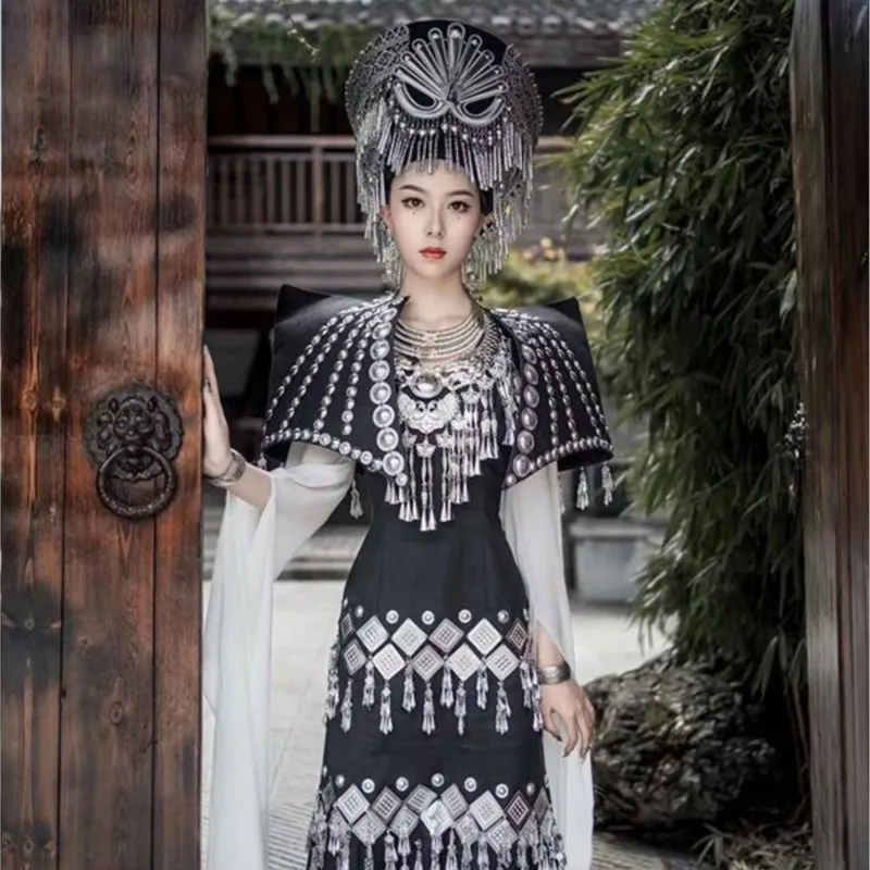 

Photography catwalk clothing Miao nationality Yunnan Yi new traditional minority travel wind shoulder pads