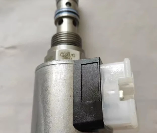 Solenoid directional valve for roller press in cement plant