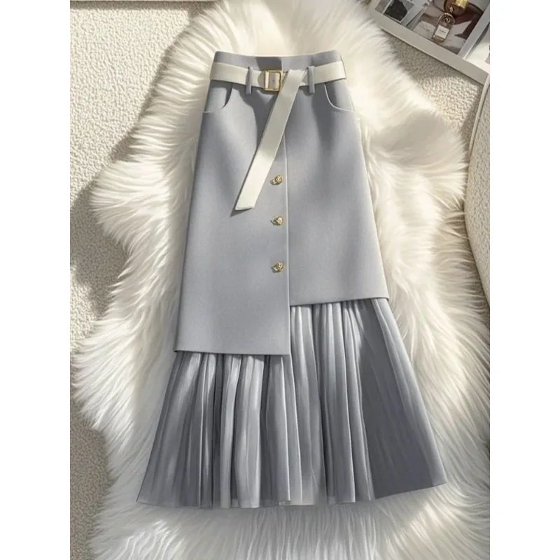 ชุดเสื้อคาร์ดิแกนถักนิตติ้งอเนกประสงค์สไตล์ต่างประเทศสุดชิคสำหรับฤดูใบไม้ผลิและฤดูใบไม้ร่วง พร้อมกระโปรงเข้าชุด ไม่ซ้ำใคร