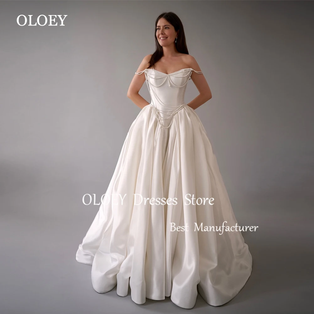 

OLOEY Exquisite Ivory A Line Wedding Dress Pleats Satin Pearls Off Shoulder Floor Length Bridal Gown Lace Up Back Customized