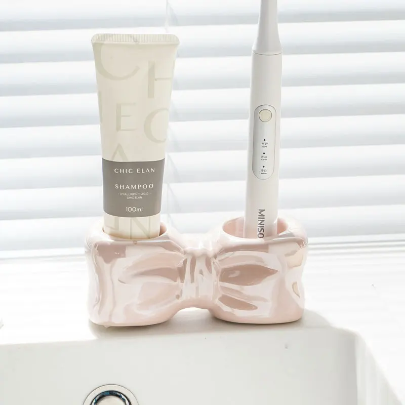 

Полка для зубной пасты, основа для хранения унитаза, умывальника, диспенсер для чашек, креативная бутылка для лосьона с бантом, электрическая подставка для зубных щеток, подставка для зубных щеток