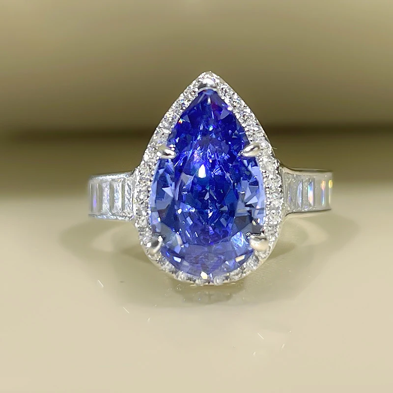 

2023 new tanzanite blue ring female 8*13 ice flower cut personality fashion ring 5A zircon factory direct sales