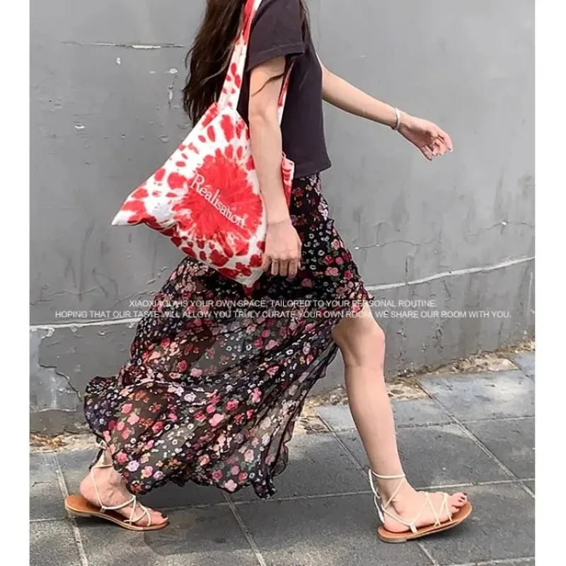 

Женская черная юбка-макси с цветочным принтом и разрезом из шифона для повседневной носки и отпуска