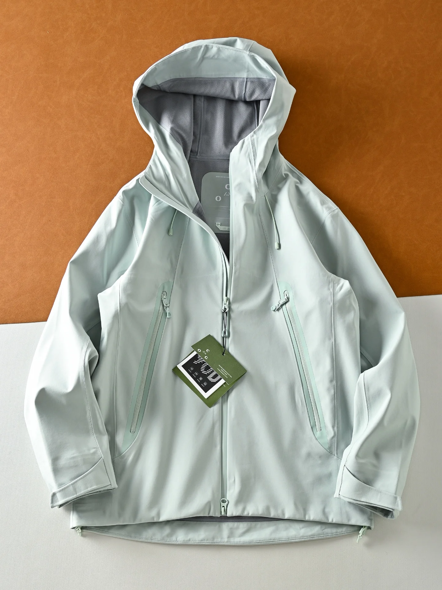 

Мужская повседневная ветрозащитная водонепроницаемая походная куртка свободного покроя из полиэфирного волокна, длинное пальто с капюшоном на молнии све