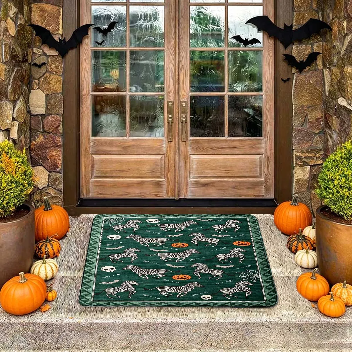 A dark green zebra skeleton pumpkin floor mat with personalized and trendy theme decoration for the entrance of Wansheng