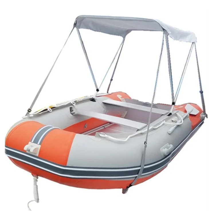 

PVC rigid inflatable rubber boat with electric motor for sale