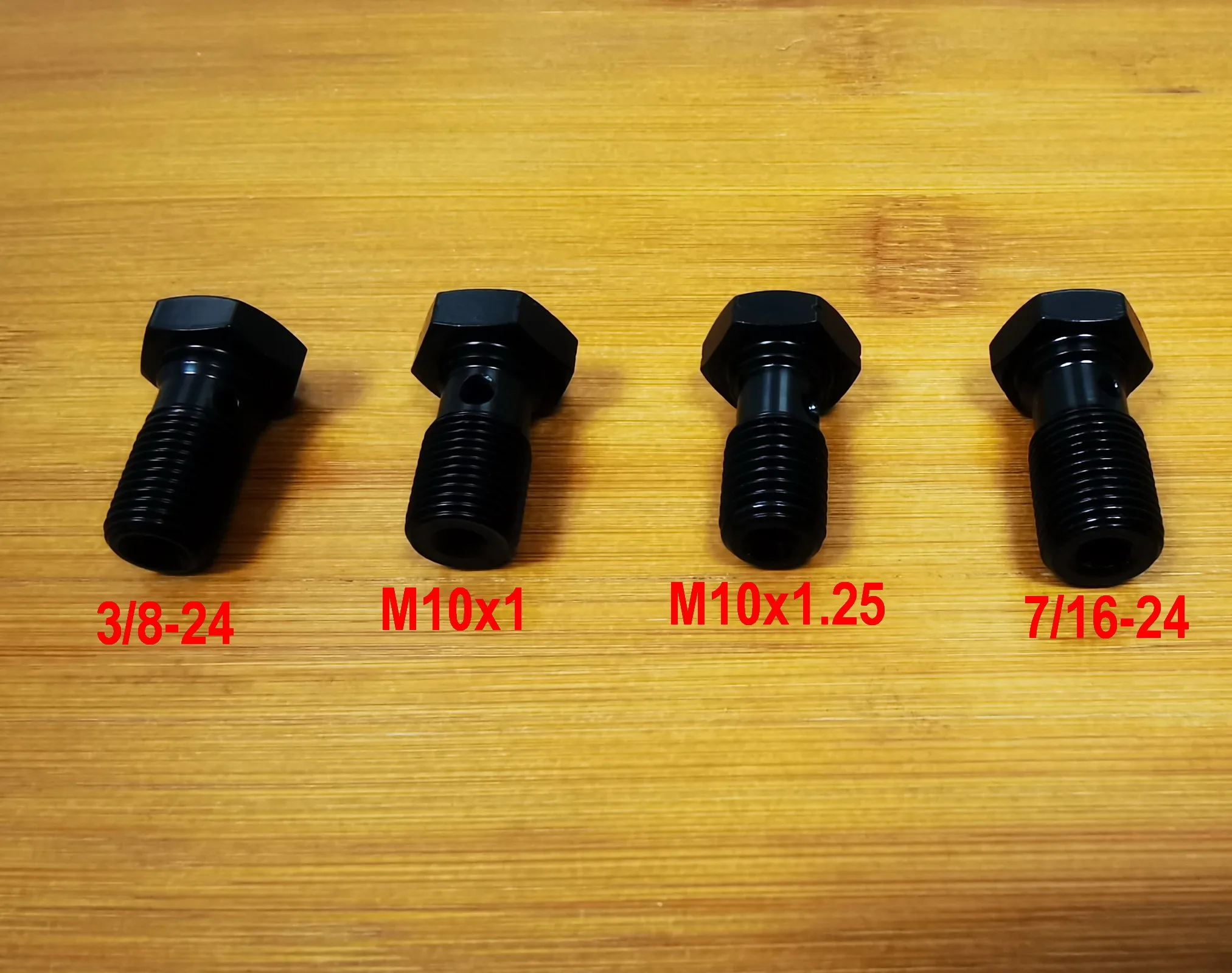 Czarna pojedyncza śruba banjo 3/8-24, M10x1, M10x1,25, 7/16-24