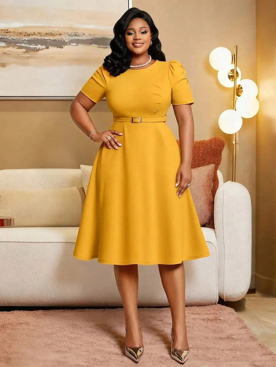 

Однотонное миди-платье А-силуэта больших размеров с пышными рукавами и поясом на талии