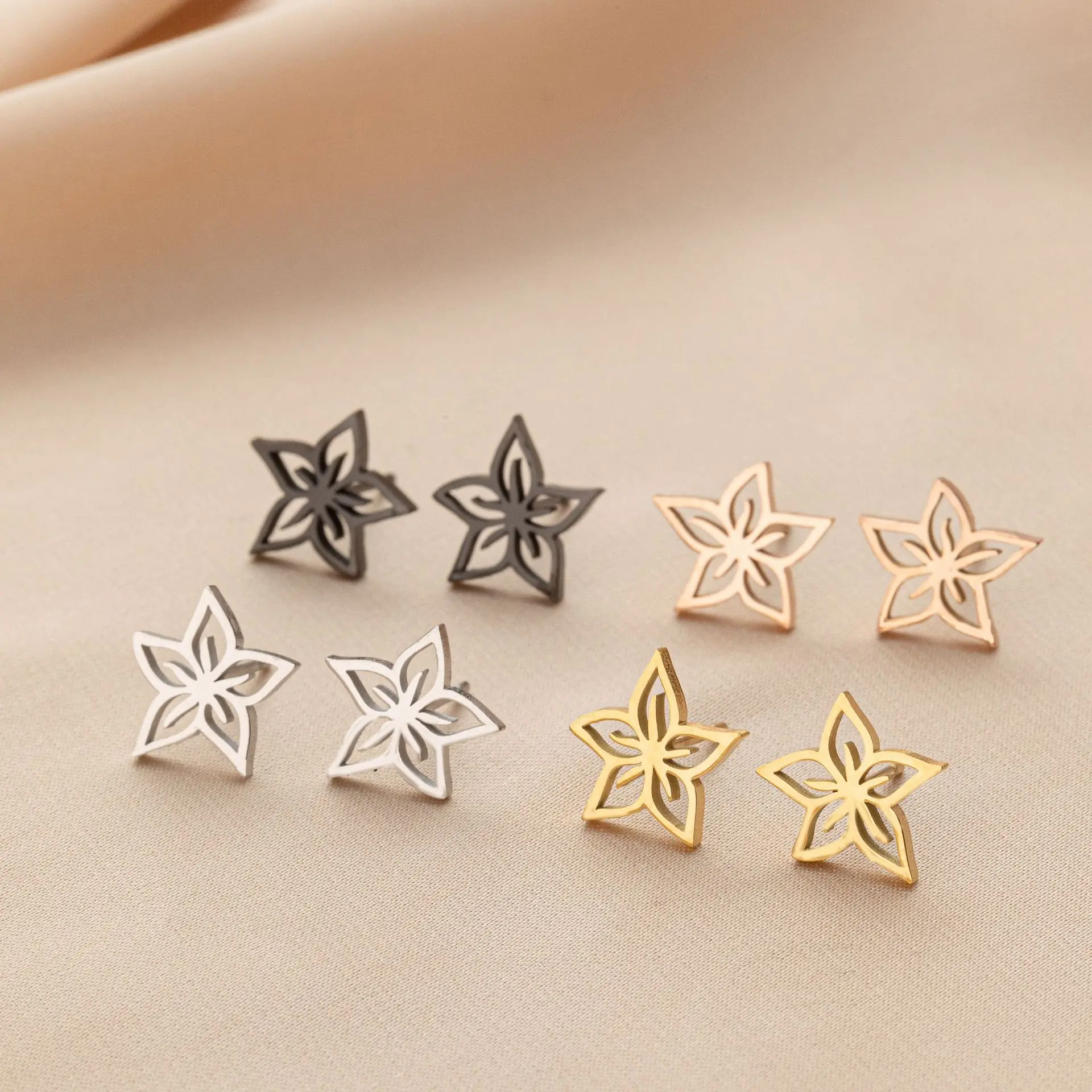 Korean version of small fresh four-color stud earrings female versatile temperament stainless steel niche peach blossom plum blo
