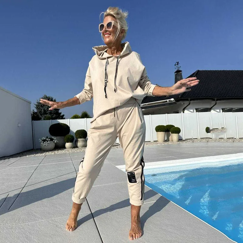 

Women Casual 2 Piece Set 2025 Fall Solid Color Hooded Sweatshirt and Capri Pants Outfit