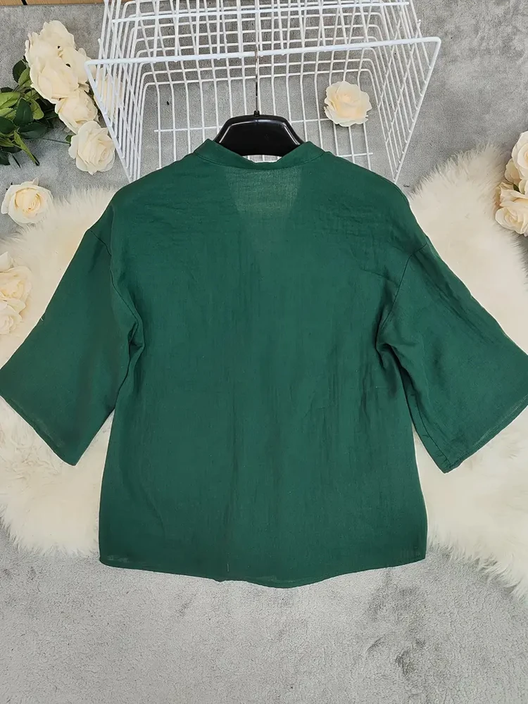 Plus Size Green Linen Blouse for Curvy Women. V-neck half sleeve button shirt with multi pockets. Oversized loose fit perfectly view 2