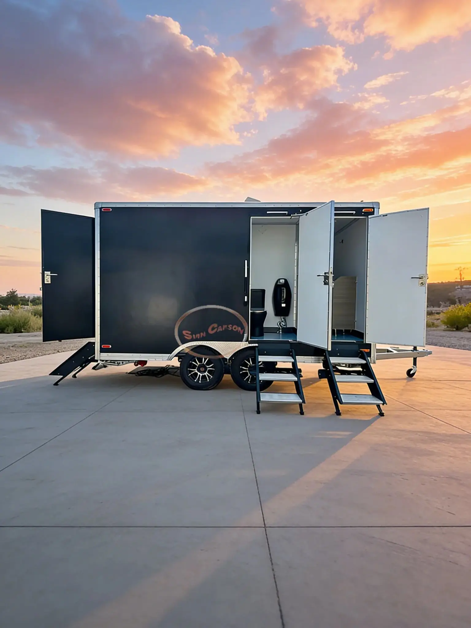Black Outdoor Mobile Toilet with Foldable Access Steps - Portable Sanitation Solution with Four Separate Restroom Compartments
