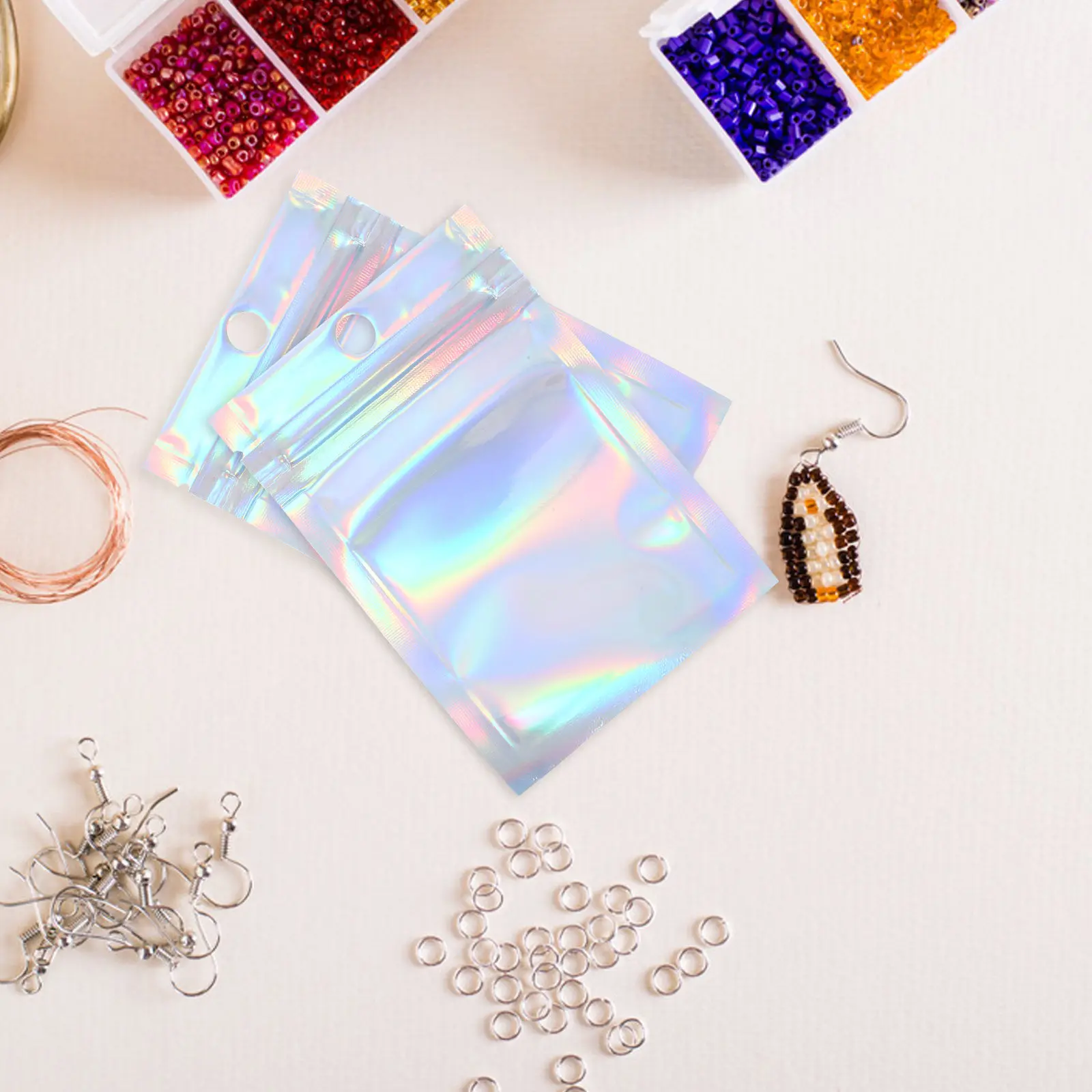 

100 шт. блестящих прозрачных пакетов для украшений с застежкой, маленькие портативные мешочки для хранения ожерелий, колец, серег