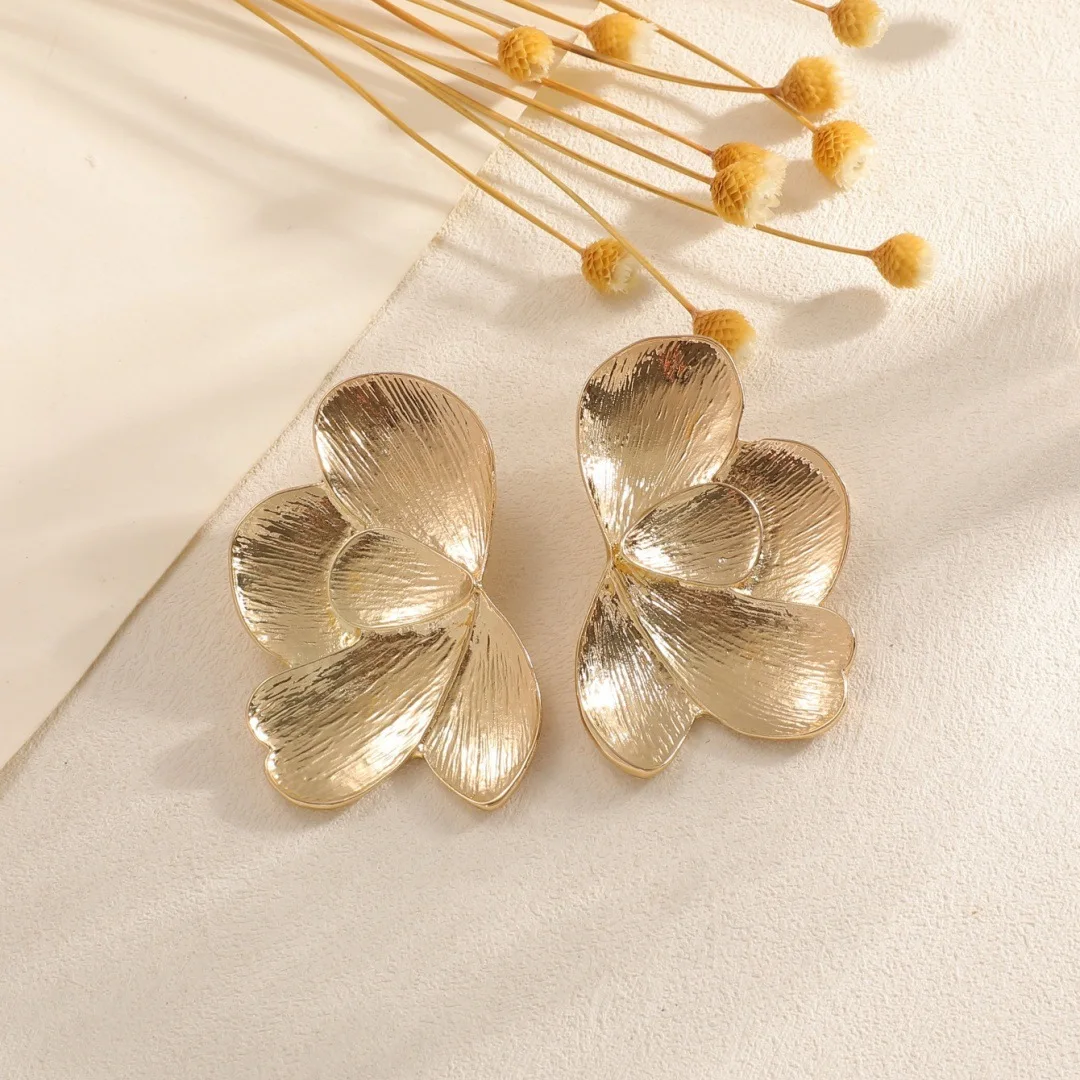 American alloy petal modeling earrings three-dimensional cascading design texture smooth texture stud earrings