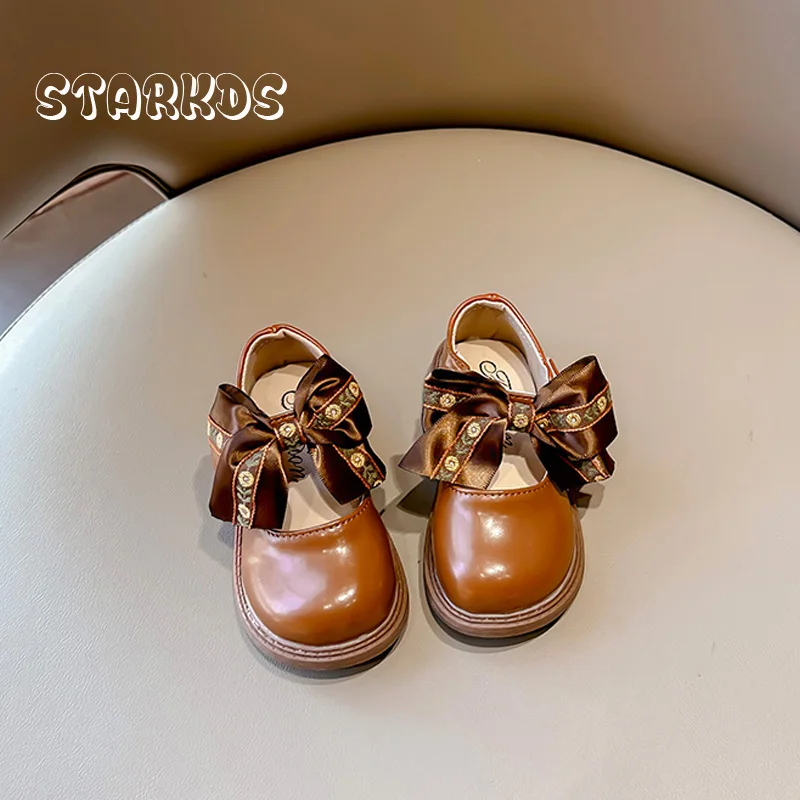 Mocassini ricamati con fiori Chic per neonate suola spessa Riband Bowknot ballerine Toddler Kids Retro scarpe in pelle con punta tonda