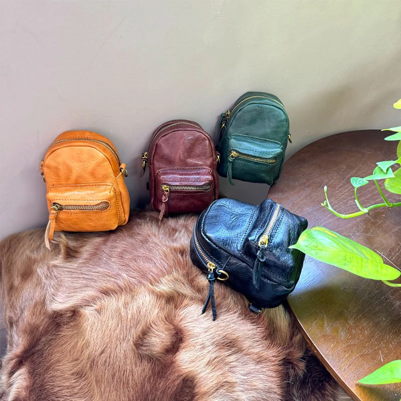 Genuine leather mini backpack versatile bag fashion casual women's Korean version travel bag backpack vintage decoration pendant