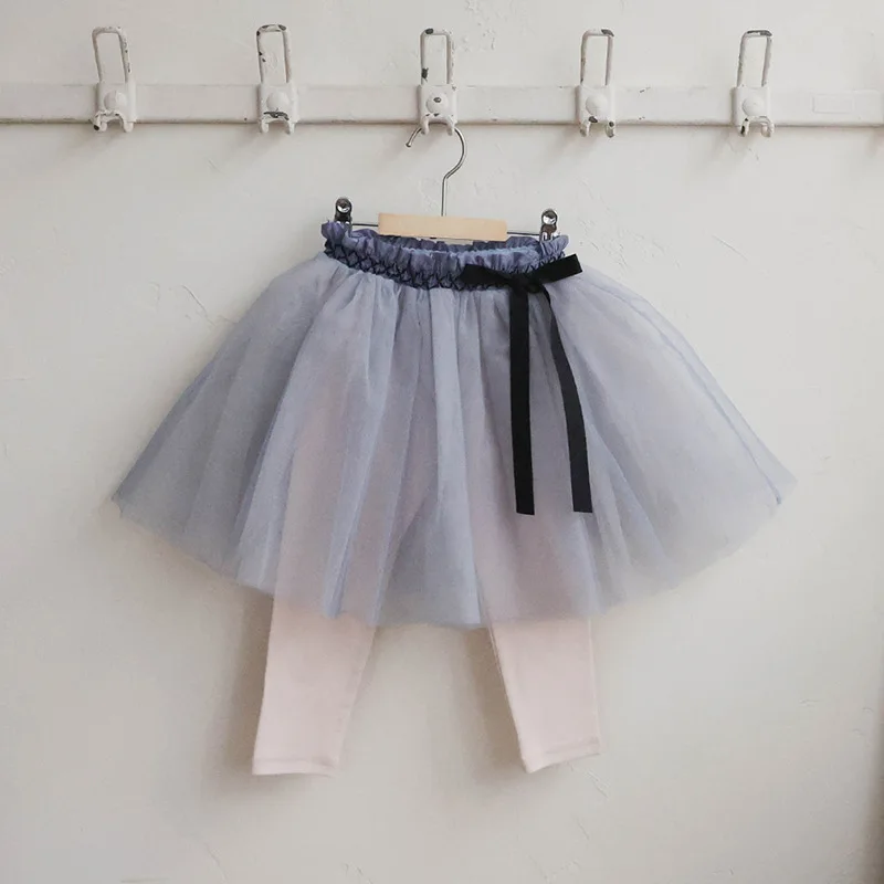 

Осень 2023, новый корейский стиль, комплект с юбкой и брюками для девочек, сетчатый топ с эластичной резинкой на талии, модный искусственный дизайн из двух предметов