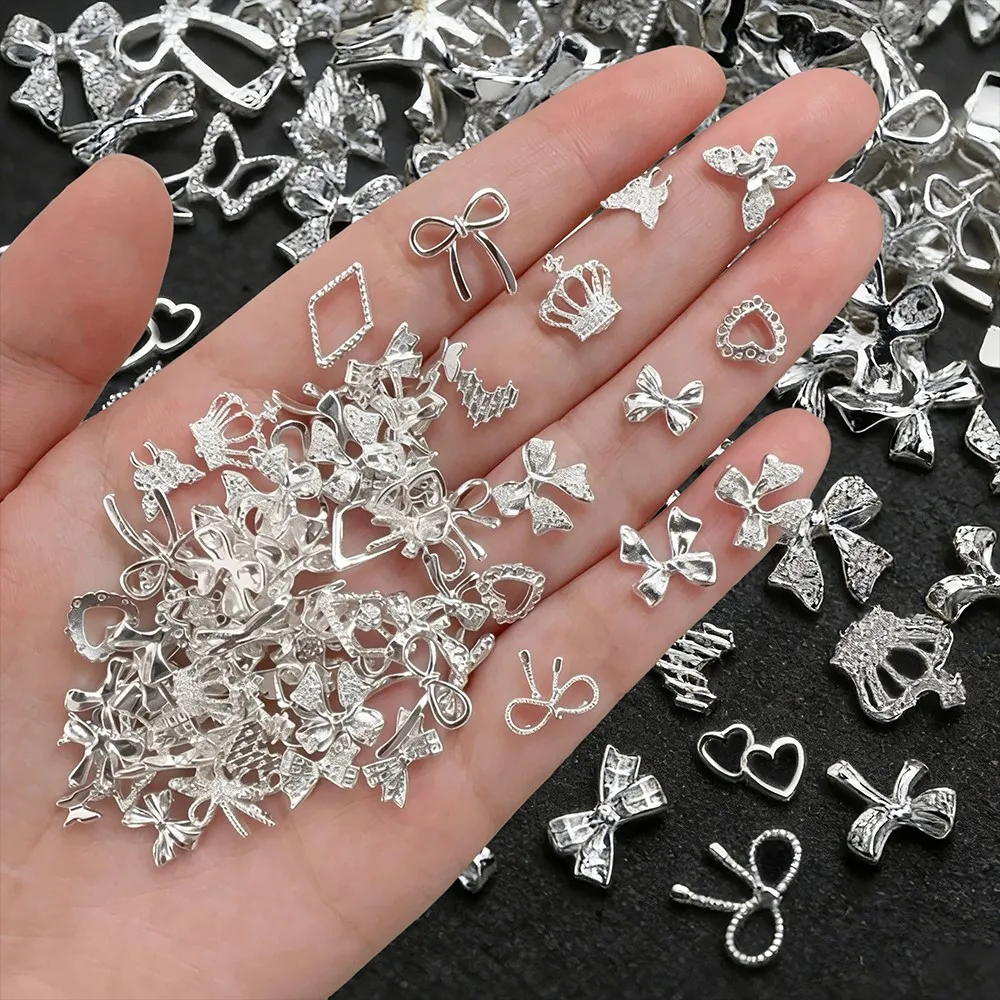 ชาร์มตกแต่งเล็บรูปโบว์ผีเสื้อโลหะผสมสีเงินสีทอง 50 ชิ้น สไตล์ Y2k น่ารัก รูปโบว์ผูกผม รูปหัวใจ ของตกแต่งเล็บโลหะ โบว์ผูกผมแบบผสม อุปกรณ์ทำเล็บ