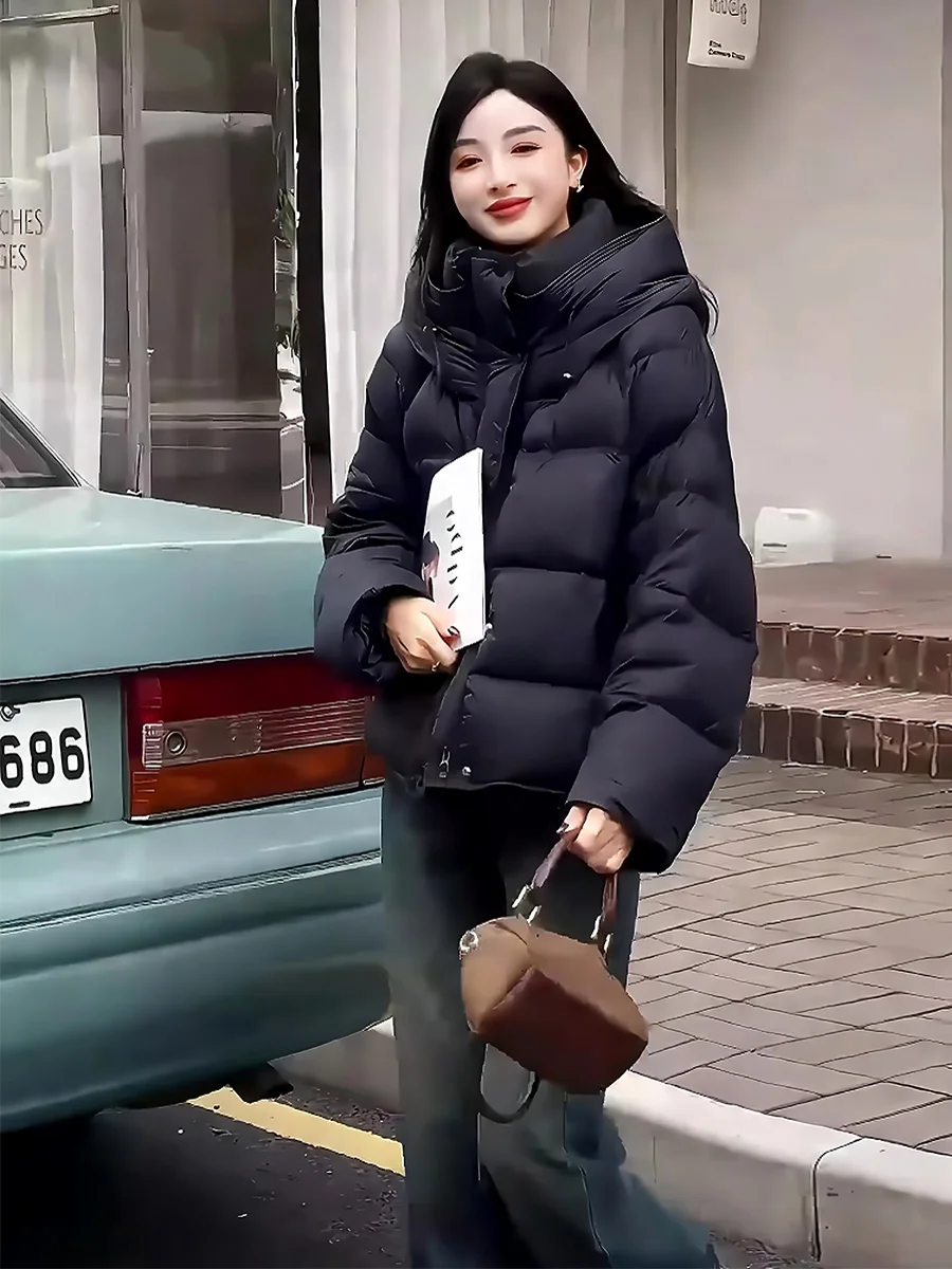 เสื้อโค้ทผู้หญิงแบบมีฮู้ดบุขนเป็ดสำหรับฤดูหนาว รุ่น Bla Puffer Jaet  แบบยาว สีขาว เหมาะสำหรับการเดินทาง