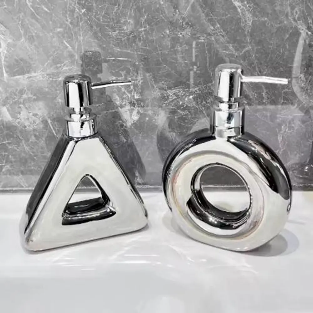 

Fashion Ceramic Emulsion Ceramic Empty Bottle Silver Hollowing Soap Dispenser 300ML Round Shampoo Bottles for Home