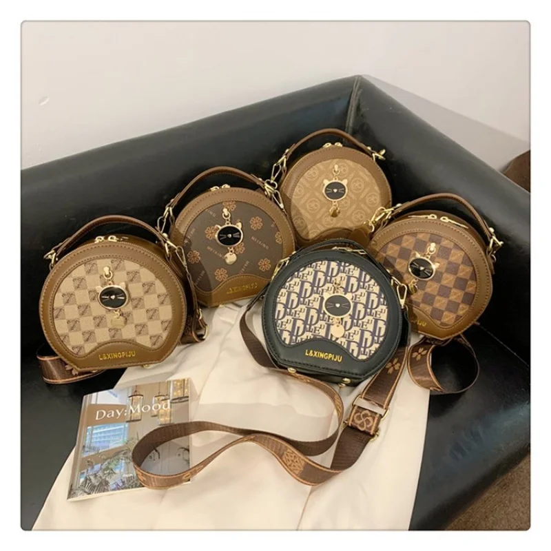 

Statement Making Leather Tote Bag For Ladies With Bold Hardware And Famous Designer Inspired Look