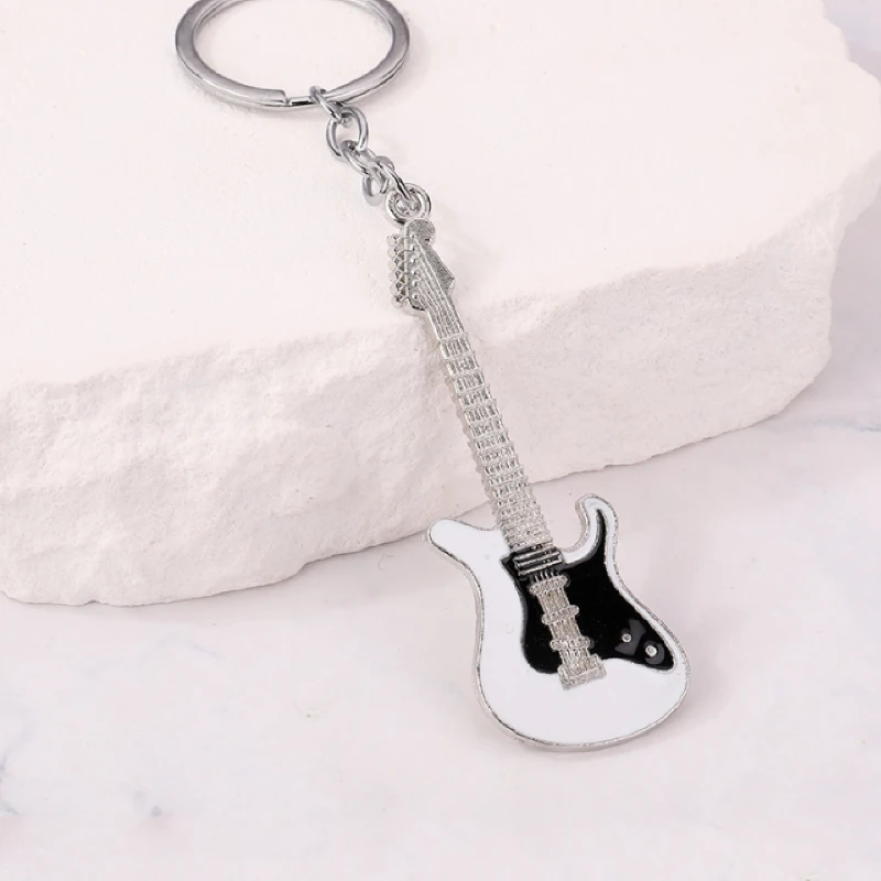 1pcs musical instrument pendant movable gift bag adorns guitar key ring