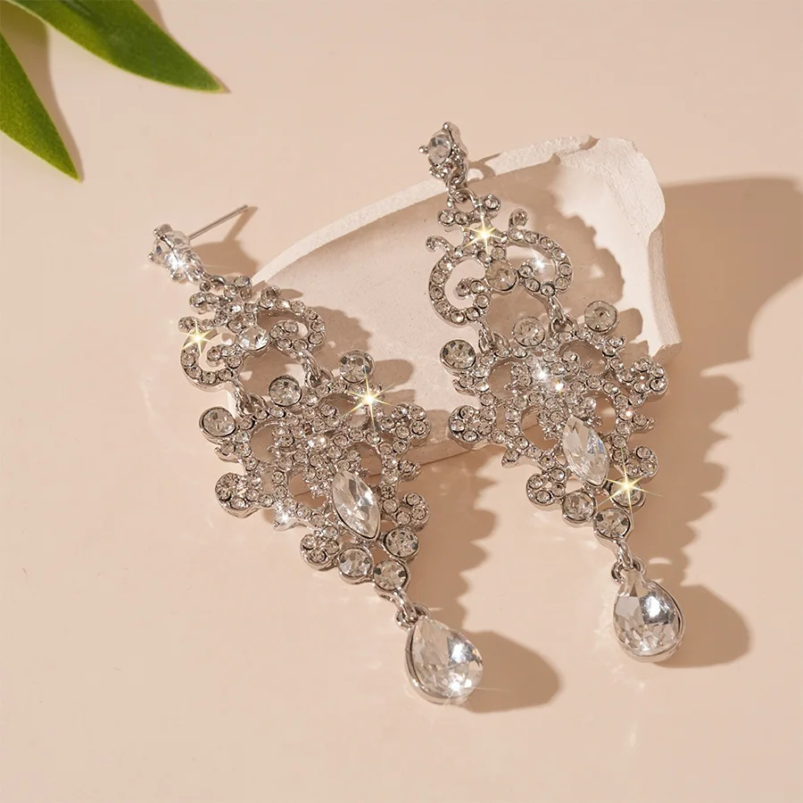 Super flash light luxury style diamond-set pattern water drop fringed silver needle earrings, niche temperament high-end  women