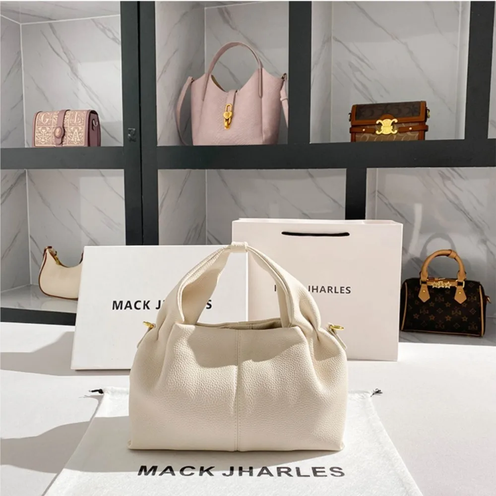 

2026 New Designer Cloud Fashion Versatile Women's Handheld Dumpling Bag Crossbody Commuter Single Shoulder Bag Trendy