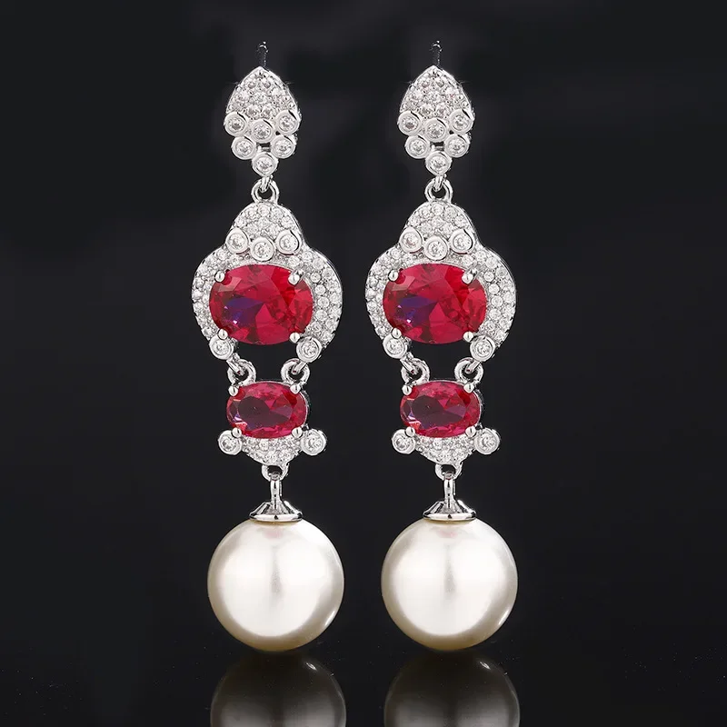 

Elegant Red Gem and Pearl Drop Earrings Luxurious Silver Setting with Crystal Accents Perfect for Formal Events and Evening Wear