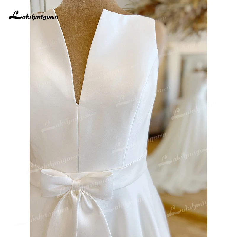 Robe de mariée trapèze Simple, élégante, Sexy, col en v, sans manches, balayage, bouton au dos, ceinture avec nœud, pour femmes