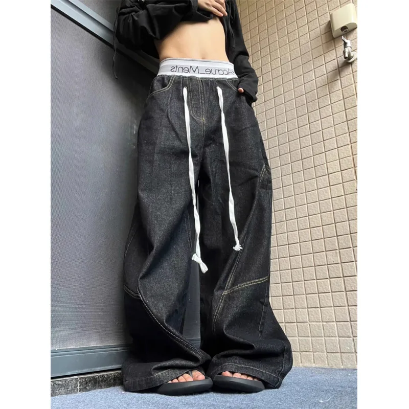 

American high street washed three-dimensional deconstruction fake two-piece waist joint curved knife denim