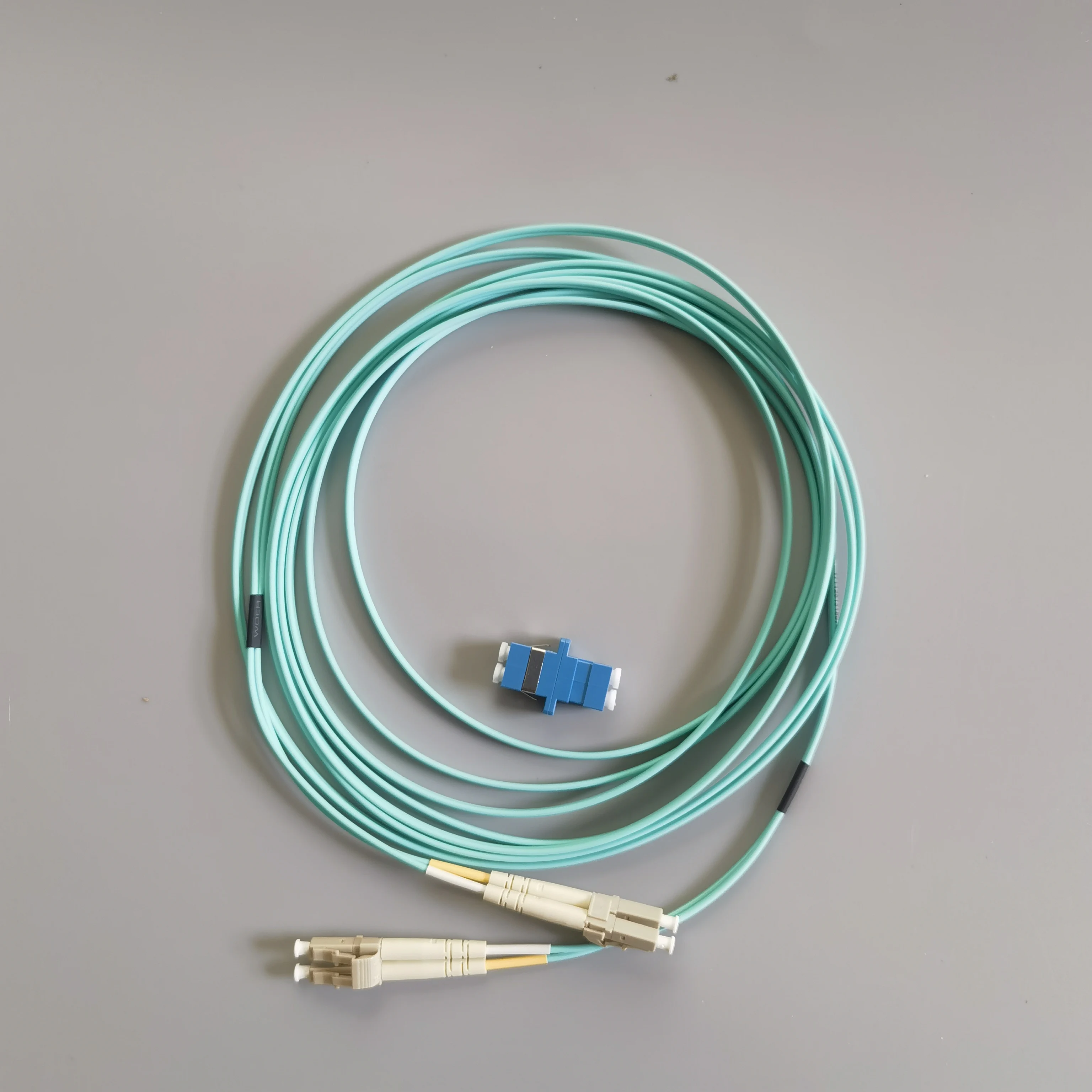 Fiber Optic Cable 1M-100M LC/UPC-LC/UPC OM3 10G Duplex Multimode Dual Core 2.0mm FTTH Indoor Optic Patch Cord Cable with LC Adap