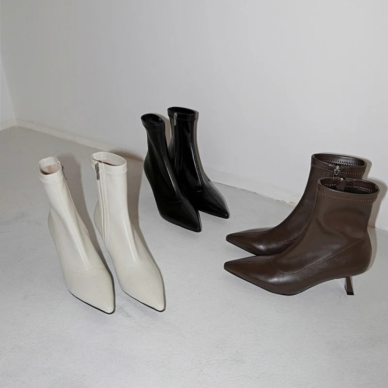 

Couture-Inspired & Runway Leather Ankle Boots with a Signature Asymmetric Heel Sophisticated Woman