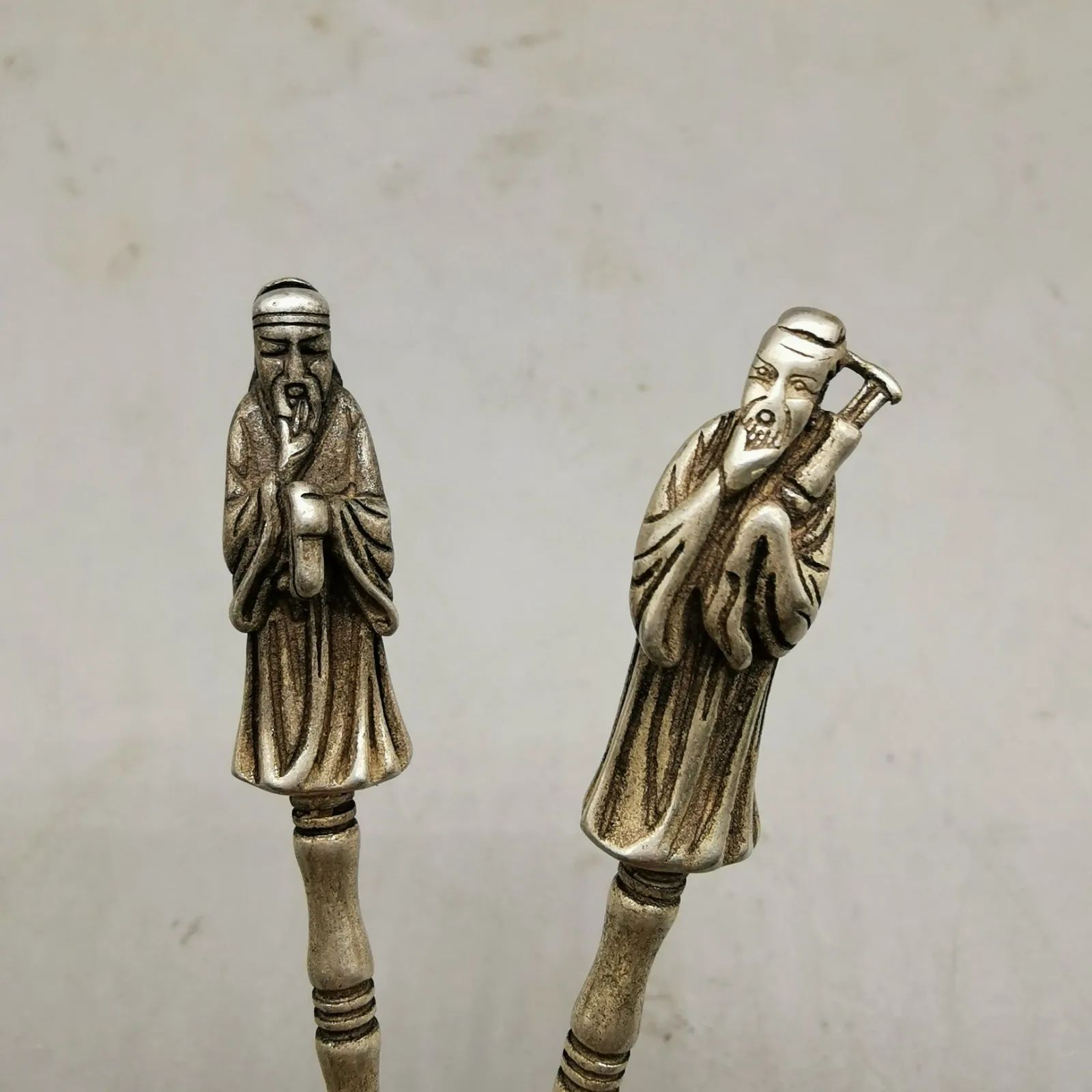 

A set of Tibetan silver Eight Immortals spoons