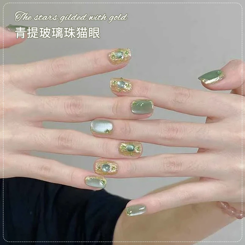 Qingti glass beads cat eye nail polish glue is popular in summer  showing white milk green nail polish