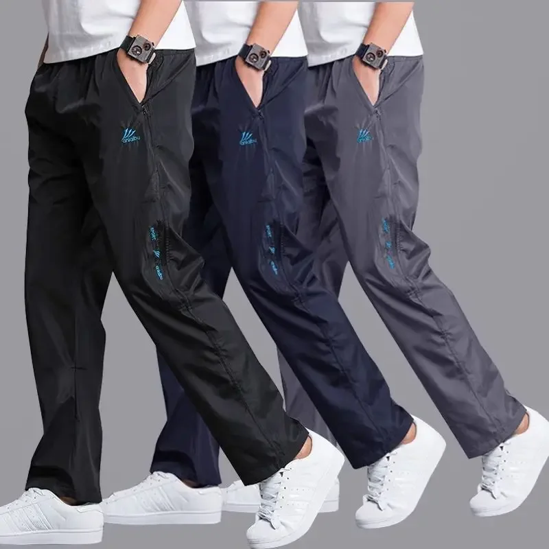 

Mens Spring Autumn Pants Men Sweatpants Mens Streetwear Thin Breathable Quick Dry Trousers Male Loose Straight Joggers Pants 4xl