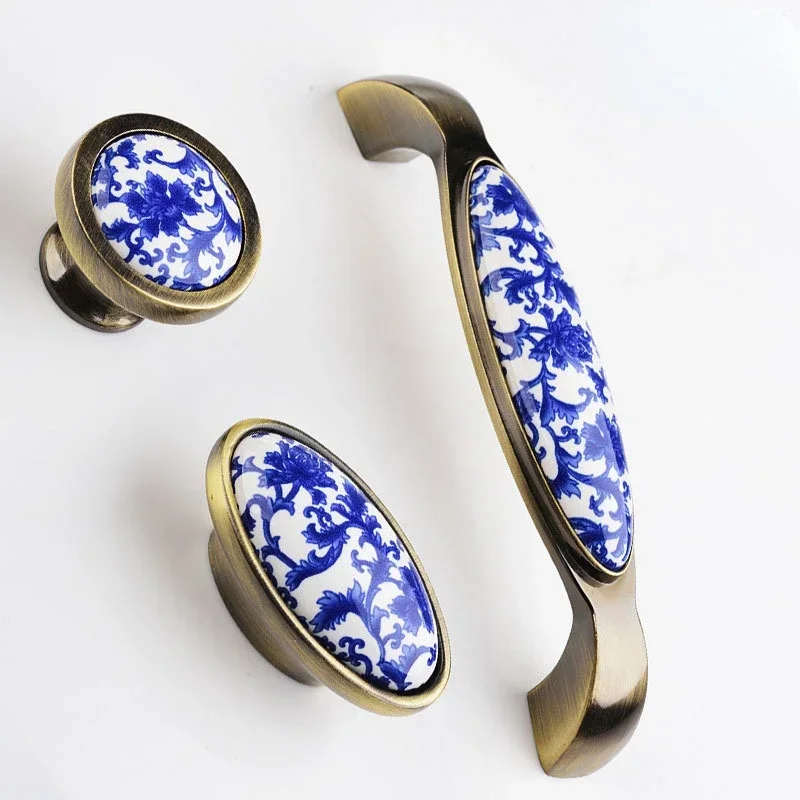 青と白の磁器製キッチンキャビネットハンドル、ソリッドシングルホール引き出しノブ、亜鉛合金ワードローブドアプルハンドル