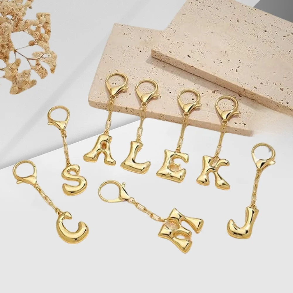 chaveiro-de-letras-do-alfabeto-com-26-letras-pequ-ente-banho-de-ouro-8k-design-Unico-decoracao-de-alto-padrao
