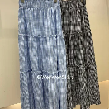 동대문 2023 여름 새로운 한국어 스타일 느슨한 하이 웨이스트 고무 스레드 접합 긴 캐주얼 격자 무늬 미니 스커트 여성 패션 