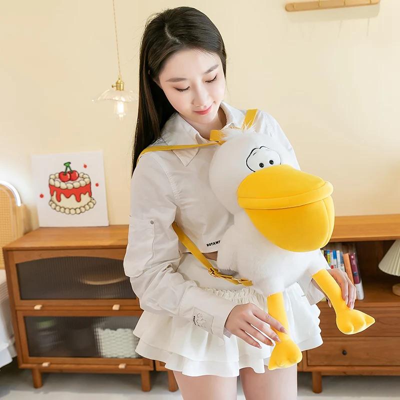 น่ารัก Pelican Plush กระเป๋าเป้สะพายหลังของเล่นน่ารัก Waterfowl ตุ๊กตากระเป๋าเป้สะพายหลังสําหรับเพื่อนวันเกิดคริสต์มาสของขวัญ