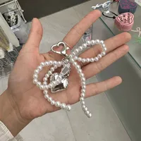 White Bowknot Heart Keychain Women Sweet Charm Pearl Bow Backpack Key Ring Handmade Jewelry Ornament Bags Pendants Gifts