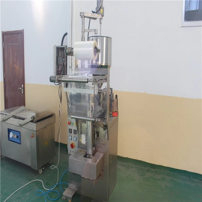 Automatic particle packaging machine, vertical packaging machine, packaging machine
