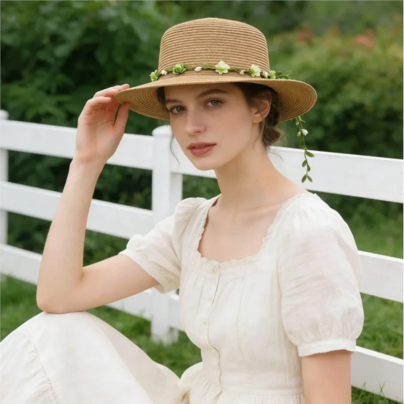 A straw-woven flat-brimmed hat decorations for women providing shade and enhancement creating small outing atmosphere