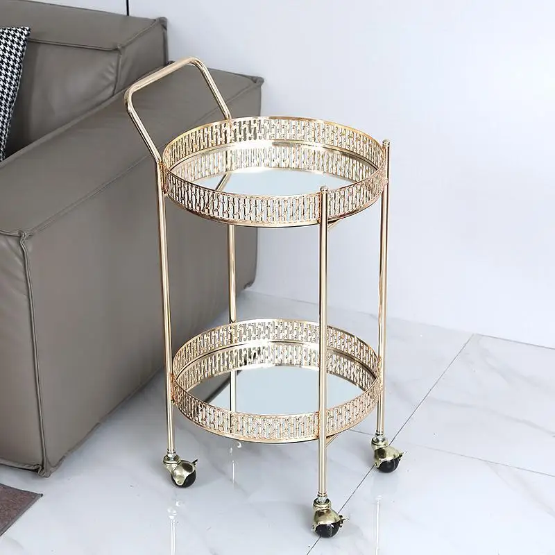 modern creative mobile trolley, a few high-value golden storage universal wheel mobile meals on the edge of the home sofa
