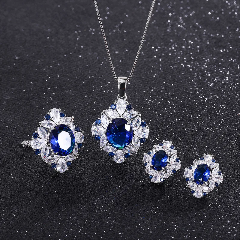 

Women Bridal Wedding Accessories Blue Sapphire Green Zircon Pendant Necklace Stud Earrings Adjustable Ring Jewelry Set