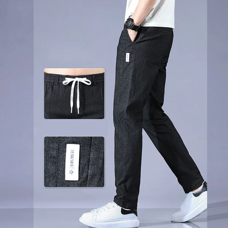 Pantaloni dritti solidi da uomo casual moda primavera autunno streetwear abiti maschili denim pantaloni sportivi larghi in vita elastica JJ593