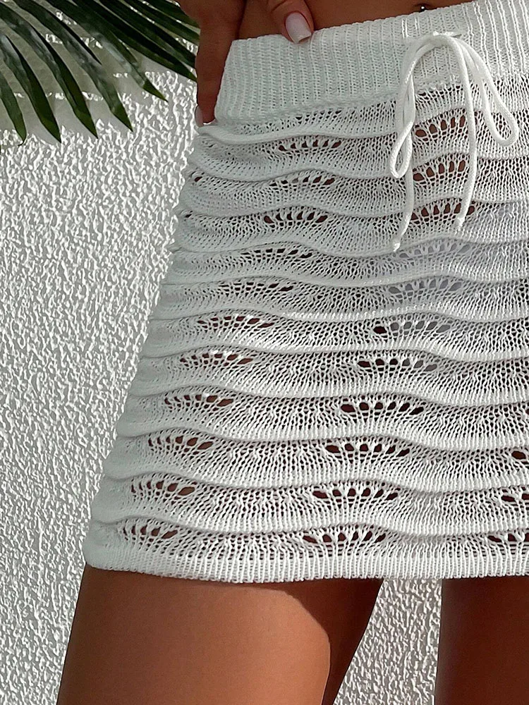 Moda plażowa Elegancka spódnica Jednolity kolor Hollow Bikini Blokowana dzianinowa krótka spódniczka