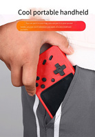A Red Retro Classic Games Children's Handheld Small Game Console With 400 Game Charging Can Be Connected To The TV